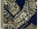 Aerial view of the property highlighting its location with access to canals and surrounding neighborhood at 400 Palm Ave, Ormond Beach, FL 32174