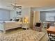 Comfortable main bedroom features a ceiling fan, and access to the dining area at 400 Palm Ave, Ormond Beach, FL 32174