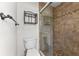Bathroom featuring tile, a glass enclosed shower, and a modern toilet at 4030 Cool Water Ct, Winter Park, FL 32792