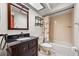 Bathroom featuring a vanity with drawers, mirror, skylight and shower at 4030 Cool Water Ct, Winter Park, FL 32792