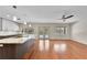 Open kitchen with island and pool view at 4030 Cool Water Ct, Winter Park, FL 32792