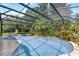 View of backyard screened in pool area with lounge chair at 4030 Cool Water Ct, Winter Park, FL 32792