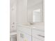 Bright bathroom featuring a white vanity with chrome fixtures and a shower with glass door at 4325 Switchgrass Ln, St Cloud, FL 34772