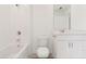 Bright bathroom with a tub and shower combination and a single-sink vanity at 4325 Switchgrass Ln, St Cloud, FL 34772