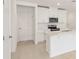 Bright kitchen featuring an island and stainless steel appliances, perfect for cooking at 4325 Switchgrass Ln, St Cloud, FL 34772