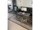 Inviting living room featuring a comfortable leather sofa, a stylish rug, and modern decor at 4820 Kathy Jo Ter, Orlando, FL 32808