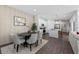 Open concept dining area next to a kitchen featuring elegant decor and modern finishes at 490 Belmond Dr, Debary, FL 32713