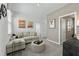 Cozy living room featuring a comfortable sofa and stylish decor at 490 Belmond Dr, Debary, FL 32713