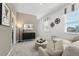 Comfortable seating area with contemporary decor and natural light at 490 Belmond Dr, Debary, FL 32713