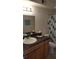 This bathroom features a decorative shower curtain at 5160 Conroy Rd # 1437, Orlando, FL 32811