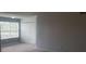 Cozy bedroom features a closet, large window for natural light, and plush carpeting for added comfort at 5160 Conroy Rd # 1437, Orlando, FL 32811