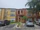 Attractive condo complex featuring well-maintained grounds, ample parking and colorful exteriors at 5160 Conroy Rd # 1437, Orlando, FL 32811