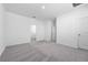 Bright bedroom with neutral walls and plush carpet at 558 Orient Ave, Debary, FL 32713