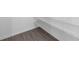A closet with wire shelving and wood-look floors for storing personal items and accessories at 558 Orient Ave, Debary, FL 32713