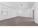 This open living area offers wood-look floors, neutral walls, and lots of natural light at 558 Orient Ave, Debary, FL 32713