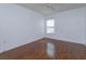 Bedroom with natural light from a window and wood floors at 6160 Froggatt St, Orlando, FL 32835