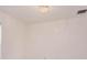 Bonus space featuring a modern light fixture and neutral colored walls at 6160 Froggatt St, Orlando, FL 32835