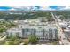 Stunning aerial view of the community and city skyline with lush surroundings at 630 Vassar St # 2508, Orlando, FL 32804