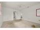 Spacious bedroom features carpet, attached bathroom and ceiling fan at 6416 Jackwood Ct, Orlando, FL 32818