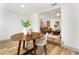 Open concept dining area connected to the living room, bright and airy at 7440 Houston E Ct, Winter Park, FL 32792