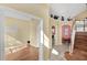 Open entryway with a view of the dining room, kitchen and staircase at 8113 Sun Palm Dr, Kissimmee, FL 34747