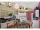 Spacious living area with open floor plan showcasing dining area, kitchen with island, and comfortable living room at 8113 Sun Palm Dr, Kissimmee, FL 34747