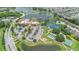 Aerial view of Del Webb Orlando's Oasis Club featuring tennis courts, a pool, and surrounding residences at 1028 Salamanca Pl, Davenport, FL 33837