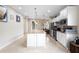 Bright and spacious kitchen with stainless steel appliances, granite countertops, and ample cabinet space at 1028 Salamanca Pl, Davenport, FL 33837