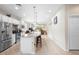 Spacious kitchen with stainless steel appliances, a large island, and an open floor plan at 1028 Salamanca Pl, Davenport, FL 33837