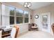 Sunlit office area with large window, comfortable chair, ideal for working at home at 1028 Salamanca Pl, Davenport, FL 33837