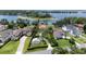 Expansive lakefront homes with manicured lawns and mature trees offer luxurious living at 11018 Lake Butler Blvd, Windermere, FL 34786