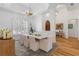 Formal dining room showcasing elegant decor, including a contemporary chandelier and shuttered windows at 11018 Lake Butler Blvd, Windermere, FL 34786