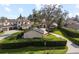 Aerial view of a sprawling property featuring a Mediterranean-style home with a long driveway, lush landscaping, and mature trees at 11018 Lake Butler Blvd, Windermere, FL 34786