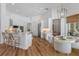 Bright, updated kitchen with white cabinets, stainless appliances, and breakfast bar seating at 11018 Lake Butler Blvd, Windermere, FL 34786