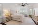 Spacious and bright main bedroom features neutral tones, plush carpets, and natural lighting at 11018 Lake Butler Blvd, Windermere, FL 34786