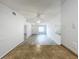Open concept living room with fan at 1113 Woodman Way, Orlando, FL 32818