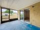 Covered patio with a screen door provides seamless indoor-outdoor living at 1113 Woodman Way, Orlando, FL 32818