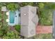 Aerial view of a home showcasing a backyard pool, patio, and well-maintained landscaping at 1135 Thunder Trl, Maitland, FL 32751