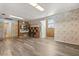 Bonus room with wood floors, shelving, and eclectic design elements at 1135 Thunder Trl, Maitland, FL 32751