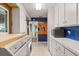 This laundry room features plenty of storage and natural light at 1135 Thunder Trl, Maitland, FL 32751