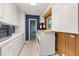 Bright laundry room with storage and lots of natural light at 1135 Thunder Trl, Maitland, FL 32751