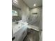 Elegant bathroom featuring a tiled shower with a built-in niche at 1139 Poppy Ave, Orlando, FL 32811