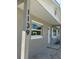 Close-up of the home's exterior showcasing the address and architectural details on a sunny day at 1139 Poppy Ave, Orlando, FL 32811
