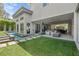 Modern backyard retreat featuring a pool, patio, and seamless indoor-outdoor living at 1820 Englewood Rd, Winter Park, FL 32789