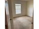 Cozy bedroom with neutral carpet and natural light at 2018 Cypress Bay Blvd, Kissimmee, FL 34743