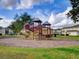 Community playground with a slide and climbing area at 2018 Cypress Bay Blvd, Kissimmee, FL 34743