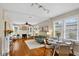 Inviting living room with fireplace, hardwood floors, and lots of natural light at 2021 University Dr, Orlando, FL 32804