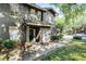 Two-story townhouse with a covered front porch and landscaped yard at 209 Villa Di Este Ter # 205, Lake Mary, FL 32746
