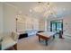 Spacious game room featuring a pool table and lounge seating for entertainment at 209 Villa Di Este Ter # 205, Lake Mary, FL 32746