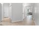 Hallway offers a glimpse of the living room at 209 Villa Di Este Ter # 205, Lake Mary, FL 32746